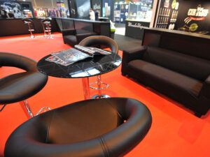 Sofas or stools? Choosing the right exhibition stand furniture for hire